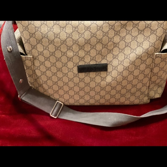 Grey and white Gucci Diaper bag